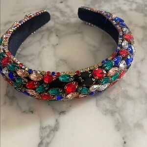 Multi-colored gem rhinestone headband.